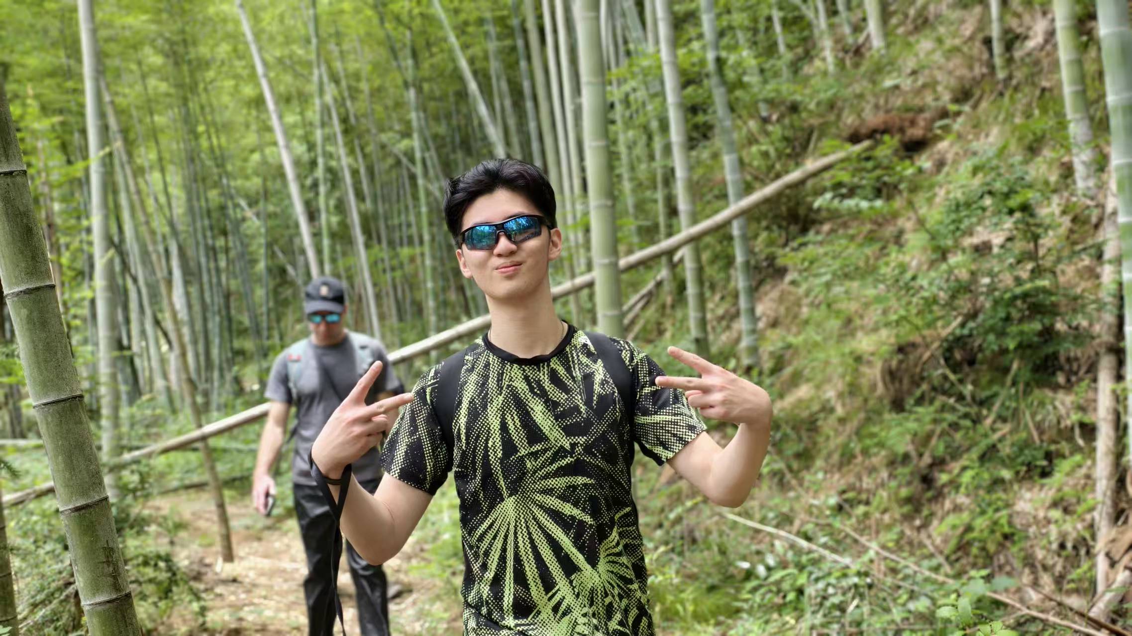 Tom Pan exploring a bamboo forest